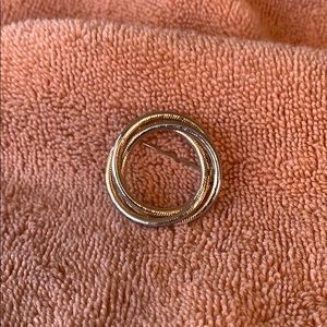 Gold toned circle pin